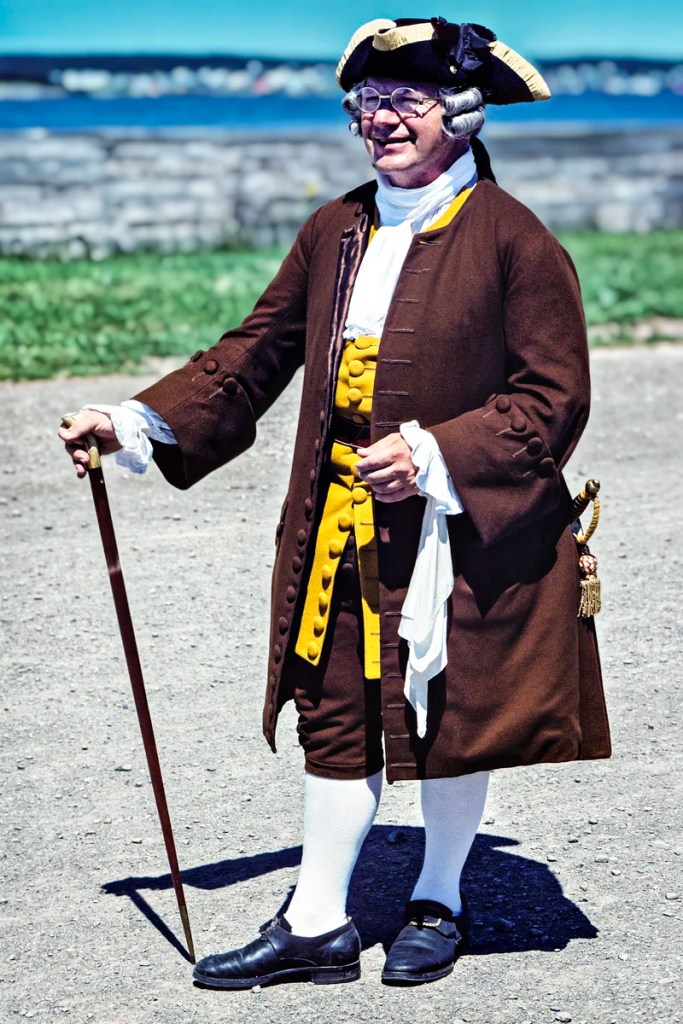 Interpreter in period costume, Fort Louisbourg, NS, Canada
