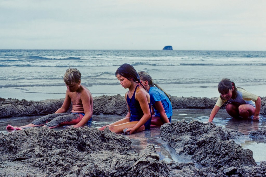 Digging Hot Pools , Hot Water Beach, NZ