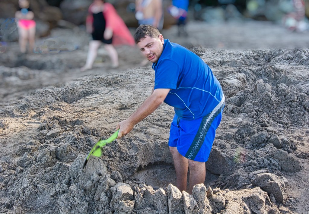 Digging Hot Pools, Hot Water Beach, NZ