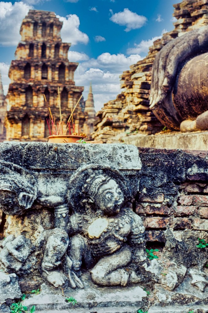 demon, joss sticks & Buddha's hand on W side of S cheddi, Wat Sri Sawai, Sukhothai