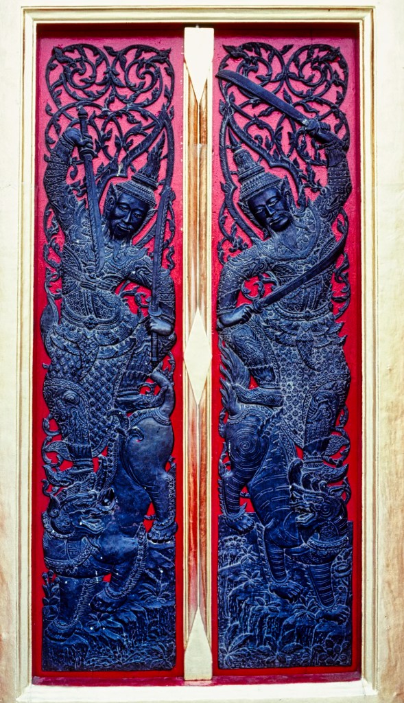 Manjushri Bas-reliefs on Red Door, Wat Benchamabophit, Bangkok, TH