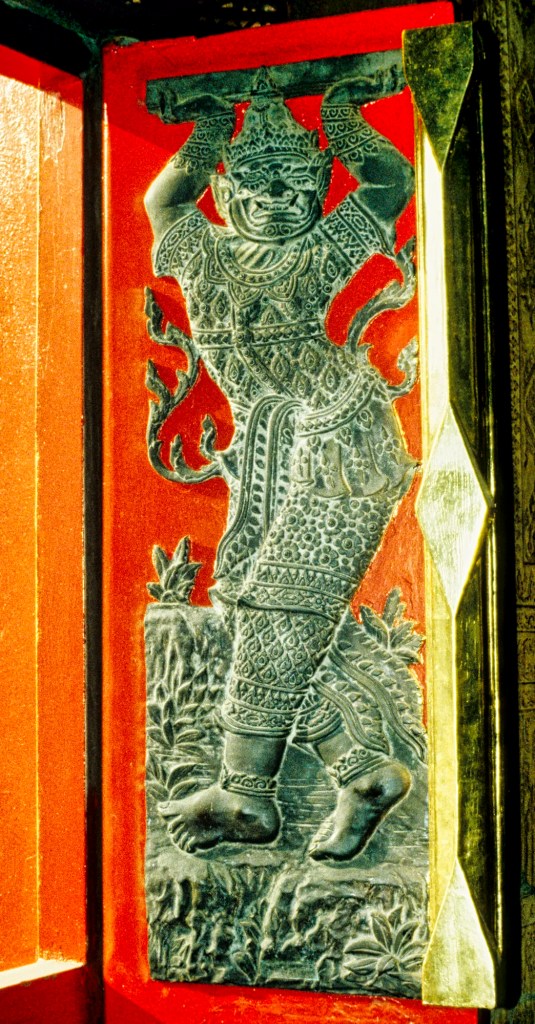 Black Bas-relief on Red Shutter, Wat Benchamabophit, Bangkok, TH