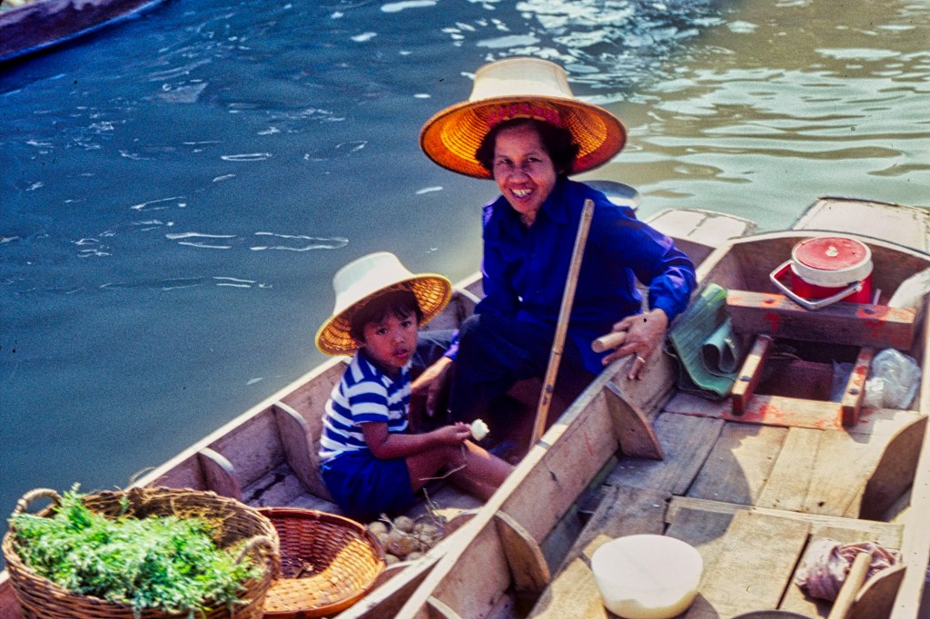 Vendor and Child, Damnoen Saduak Floating Market, TH