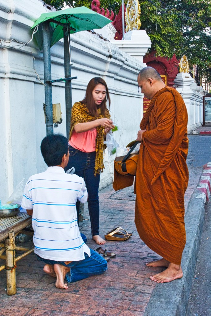 Making Merit: Feeding the Monks, Wat Chedi Luang, Chiang Mai, Thailand